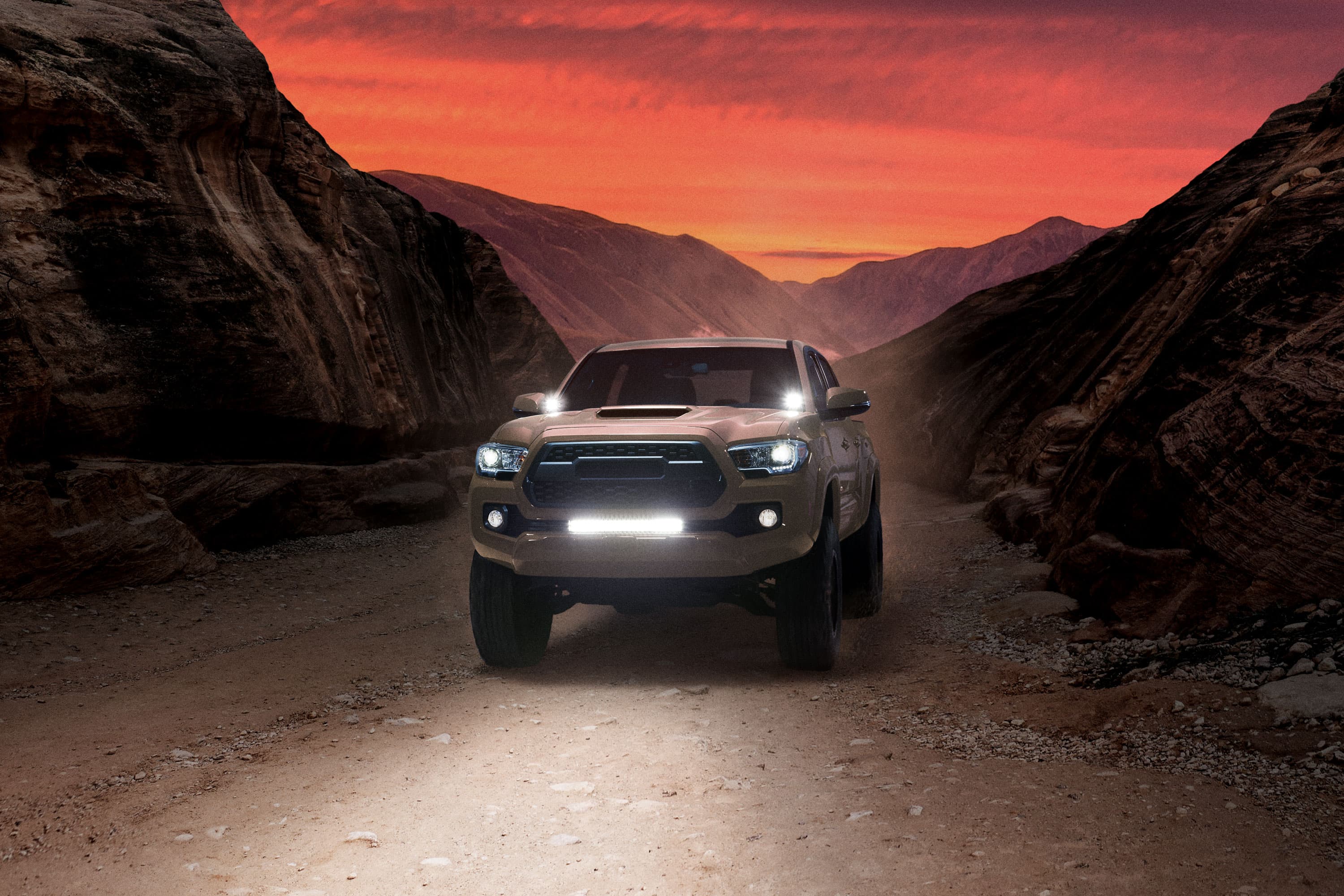 Launch film still — 4WD in a desert canyon at dusk